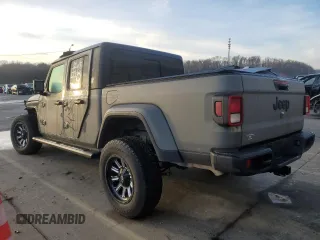 2022 Jeep Gladiator Willys с VIN 1C6HJTAG8NL107002, выставлен на аукционе Copart как лот 85138204 с пробегом 69 166 миль миль и Списание • Salvage title. История ставок и продаж доступна на DreamBid. Изображение 2.