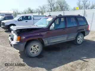 1994 Jeep Grand Cherokee Laredo with VIN 1J4GZ58Y2RC112641, listed as a IAAI auction lot 42212705 with 160,762 mi miles and . Bid and sale history available at DreamBid. Image 2.