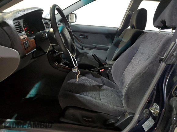 2002 Subaru Legacy Outback with VIN 4S3BH675X26654168, listed as a Copart auction lot 62105265 with 128,058 mi miles and Clean title. Bid and sale history available at DreamBid. Image 7.