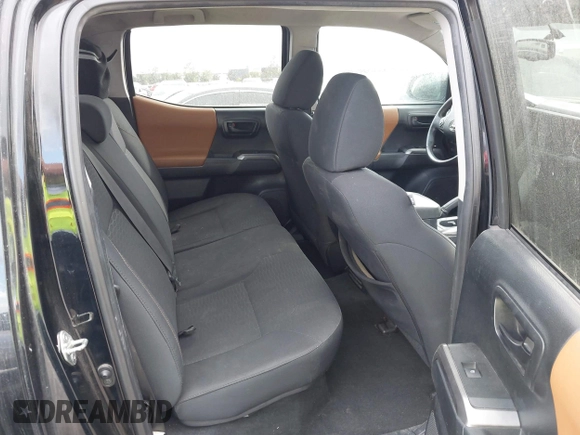 2017 Toyota Tacoma SR5 with VIN 5TFAZ5CN2HX040954, listed as a IAAI auction lot 41733137 with 97,780 mi miles and . Bid and sale history available at DreamBid. Image 8.