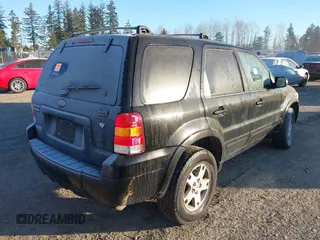2005 Ford Escape Limited with VIN 1FMCU94115KB85496, listed as a IAAI auction lot 41384428 with 158,852 mi miles and . Bid and sale history available at DreamBid. Image 4.