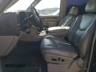 2003 Cadillac Escalade EXT z VIN 3GYEK63N03G339488, wystawiony jako Copart lot #54622395 z przebiegiem 234 427 mil mil oraz Tytuł czysty. Historia ofert i sprzedaży dostępna na DreamBid. Obrazek 7.