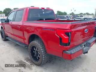 2023 Ford F-150 Lightning Pro with VIN 1FTVW1EL8PWG33656, listed as a IAAI auction lot 42260659 with 22,490 mi miles and . Bid and sale history available at DreamBid. Image 3.