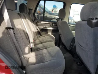 2006 GMC Envoy SLT with VIN 1GKDS13S762259102, listed as a Copart auction lot 79233224 with 125,404 mi miles and Salvage Title. Bid and sale history available at carsss.com. Image 10.