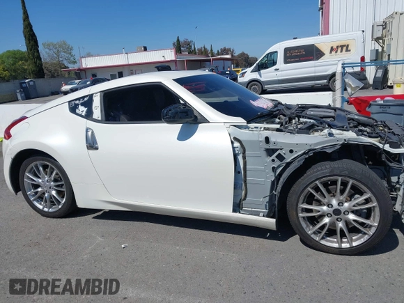 2018 Nissan 370Z Sport with VIN JN1AZ4EH3JM571169, listed as a IAAI auction lot 41859730 with 85,428 mi miles and . Bid and sale history available at DreamBid. Image 13.