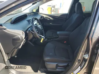 2021 Toyota Prius LE with VIN JTDKAMFP5M3177018, listed as a Copart auction lot 63930405 with 58,439 mi miles and Salvage title. Bid and sale history available at DreamBid. Image 7.
