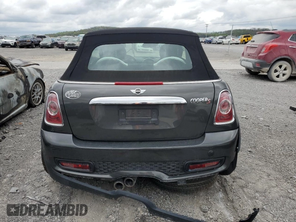 2012 MINI Convertible S with VIN WMWZP3C58CT296381, listed as a Copart auction lot 50834655 with 111,228 mi miles and Salvage Title. Bid and sale history available at DreamBid. Image 6.