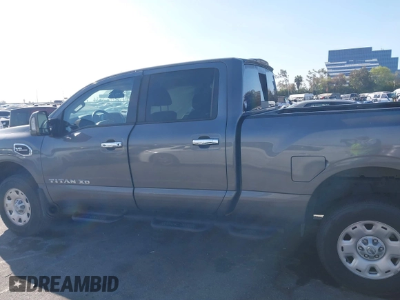 2021 Nissan Titan SV with VIN 1N6AA1FA6MN529806, listed as a IAAI auction lot 41859992 with 50,729 mi miles and . Bid and sale history available at DreamBid. Image 14.