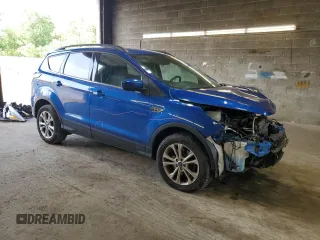 2017 Ford Escape SE z VIN 1FMCU9GD4HUD17066, wystawiony jako Copart lot #60504105 z przebiegiem 64 570 mil mil oraz Szkoda całkowita • Salvage title. Historia ofert i sprzedaży dostępna na DreamBid. Obrazek 4.