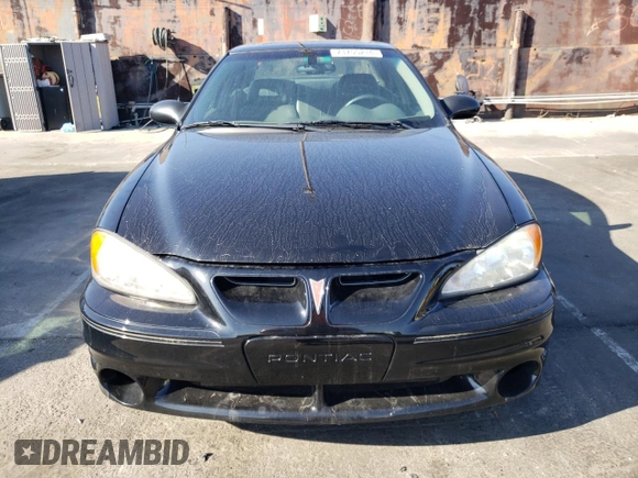 2002 Pontiac Grand Am GT with VIN 1G2NW52E12M704539, listed as a Copart auction lot 73755214 with 100,904 mi miles and Clean Title. Bid and sale history available at carsss.com. Image 5.