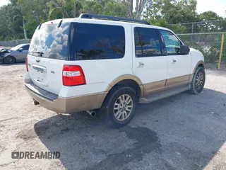 2014 Ford Expedition King Ranch with VIN 1FMJU1J50EEF14445, listed as a IAAI auction lot 42571073 with 125,174 mi miles and . Bid and sale history available at DreamBid. Image 4.