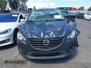 2016 Mazda CX-5 Touring with VIN JM3KE2CY6G0832967, listed as a IAAI auction lot 41943527 with 1 mi miles. Bid and sale history available at carsss.com. Image 13.