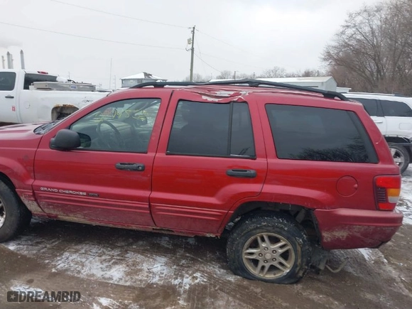 2004 Jeep Grand Cherokee Laredo with VIN 1J4GW48N64C331880, listed as a IAAI auction lot 41618664 with 287,453 mi miles. Bid and sale history available at carsss.com. Image 6.