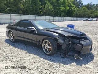1999 Pontiac Firebird Formula z VIN 2G2FV22G4X2233748, wystawiony jako Copart lot #55693535 z przebiegiem 166 622 mil mil oraz Szkoda całkowita • Salvage title. Historia ofert i sprzedaży dostępna na DreamBid. Obrazek 4.