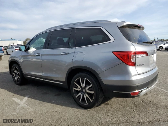 2020 Honda Pilot Touring 8-Passenger with VIN 5FNYF5H96LB005680, listed as a Copart auction lot 86409524 with 78,759 mi miles and Salvage Title. Bid and sale history available at carsss.com. Image 2.