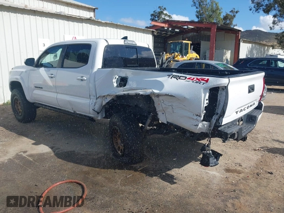 2018 Toyota Tacoma SR5 with VIN 3TMDZ5BN2JM037580, listed as a IAAI auction lot 42248418 with 35,661 mi miles and . Bid and sale history available at DreamBid. Image 3.