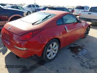2004 Nissan 350Z Enthusiast with VIN JN1AZ34D44M102606, listed as a IAAI auction lot 41123390 with 174,603 mi miles and . Bid and sale history available at DreamBid. Image 4.