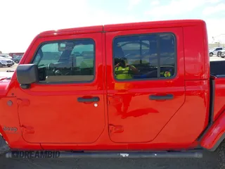 2023 Jeep Gladiator Rubicon z VIN 1C6JJTBG2PL509200, wystawiony jako IAAI lot #42537312 z przebiegiem Nie podano mil oraz . Historia ofert i sprzedaży dostępna na DreamBid. Obrazek 13.