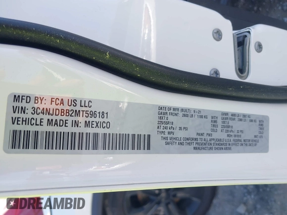 2021 Jeep Compass Altitude with VIN 3C4NJDBB2MT596181, listed as a IAAI auction lot 42026716 with 69,526 mi miles and . Bid and sale history available at DreamBid. Image 9.