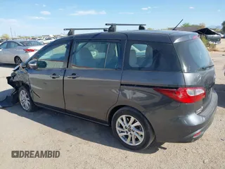 2013 Mazda 5 Sport with VIN JM1CW2BL4D0145725, listed as a IAAI auction lot 42190177 with 143,209 mi miles and . Bid and sale history available at DreamBid. Image 14.