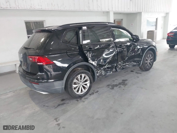 2019 Volkswagen Tiguan S with VIN 3VV1B7AX1KM073074, listed as a IAAI auction lot 41387775 with 57,045 mi miles. Bid and sale history available at carsss.com. Image 4.