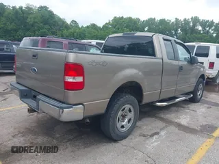 2005 Ford F-150 XLT with VIN 1FTPX14575NA05423, listed as a IAAI auction lot 42365484 with 118,634 mi miles and . Bid and sale history available at DreamBid. Image 4.
