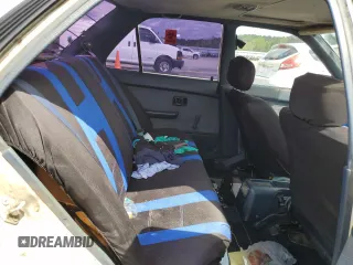 1990 Toyota Corolla z VIN JT2AE94A5L3323663, wystawiony jako Copart lot #71963834 z przebiegiem 354 386 mil mil oraz Szkoda całkowita • Salvage title. Historia ofert i sprzedaży dostępna na DreamBid. Obrazek 10.