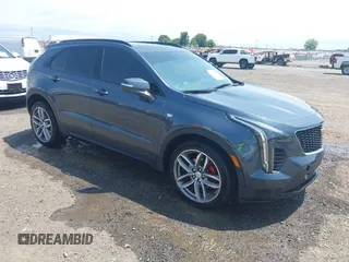 2021 Cadillac XT4 FWD Sport with VIN 1GYFZER41MF079193, listed as a IAAI auction lot 42331594 with 72,287 mi miles and . Bid and sale history available at DreamBid. Image 1.