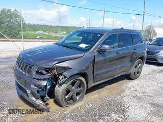 2016 Jeep Grand Cherokee Overland with VIN 1C4RJFCG6GC417485, listed as a IAAI auction lot 42210973 with 115,612 mi miles and . Bid and sale history available at DreamBid. Image 2.