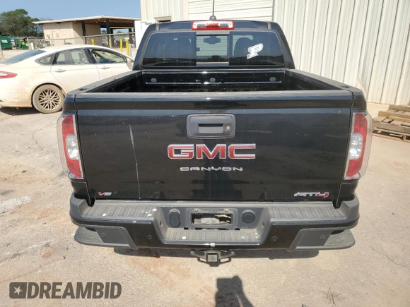 2021 GMC Canyon 4WD AT4 w/Cloth with VIN 1GTG6FEN1M1295551, listed as a Copart auction lot 74900294 with 39,853 mi miles and Salvage Title. Bid and sale history available at carsss.com. Image 6.