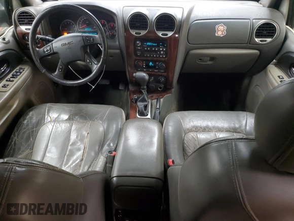 2003 GMC Envoy SLT с VIN 1GKET16S736148082, выставлен на аукционе Copart как лот 53889665 с пробегом 179 774 миль миль и Чистый • Clean title. История ставок и продаж доступна на DreamBid. Изображение 8.