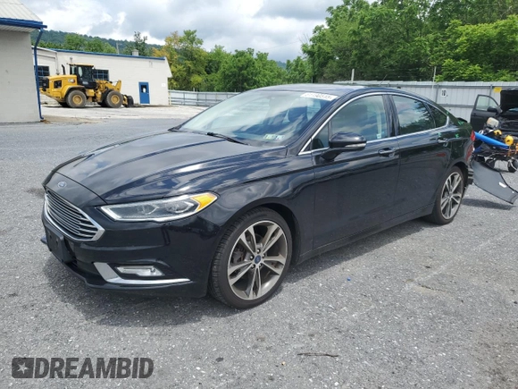 2017 Ford Fusion Titanium z VIN 3FA6P0K92HR192881, wystawiony jako Copart lot #61190515 z przebiegiem 109 834 mil mil oraz Szkoda całkowita • Salvage title. Historia ofert i sprzedaży dostępna na DreamBid. Obrazek 1.