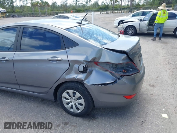2015 Hyundai Accent GLS with VIN KMHCT4AE8FU861963, listed as a IAAI auction lot 42161059 with 132,629 mi miles and . Bid and sale history available at DreamBid. Image 6.