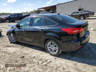 2015 Ford Focus SE with VIN 1FADP3F26FL228606, listed as a Copart auction lot 52525445 with 37,477 mi miles and Salvage Title. Bid and sale history available at DreamBid. Image 2.