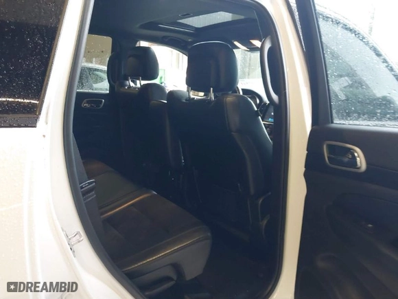 2019 Jeep Grand Cherokee Laredo E with VIN 1C4RJFAG1KC818289, listed as a IAAI auction lot 41602541 with 59,356 mi miles. Bid and sale history available at carsss.com. Image 8.