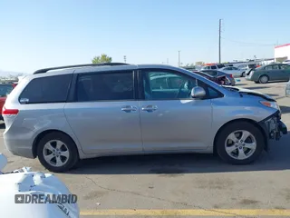 2013 Toyota Sienna LE AAS with VIN 5TDKK3DC6DS371126, listed as a IAAI auction lot 42006353 with 141,425 mi miles. Bid and sale history available at carsss.com. Image 13.