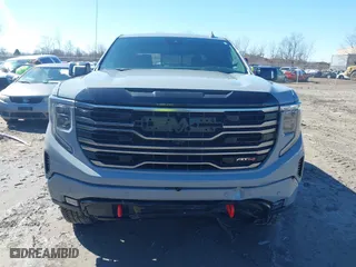2025 GMC Sierra 1500 AT4 with VIN 3GTUUEELXSG138620, listed as a IAAI auction lot 41805574 with 13,056 mi miles. Bid and sale history available at carsss.com. Image 12.