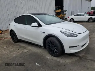 2022 Tesla Model Y Long Range z VIN 7SAYGDEE5NA016276, wystawiony jako Copart lot #55942355 z przebiegiem 14 085 mil mil oraz Szkody całkowita. Historia ofert i sprzedaży dostępna na DreamBid. Obrazek 4.