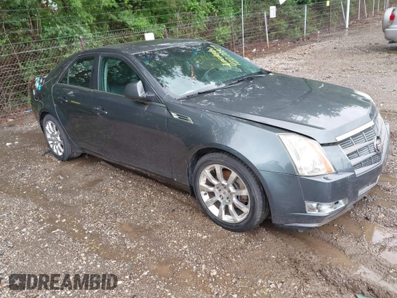2009 Cadillac CTS AWD z VIN 1G6DT57V790133622, wystawiony jako IAAI lot #42272929 z przebiegiem 124 695 mil mil oraz . Historia ofert i sprzedaży dostępna na DreamBid. Obrazek 1.