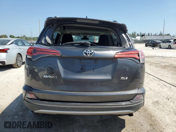 2018 Toyota RAV4 XLE with VIN 2T3WFREV1JW475641, listed as a Copart auction lot 54357525 with 53,609 mi miles and Salvage Title. Bid and sale history available at DreamBid. Image 6.