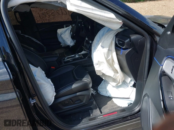 2023 Ford Explorer ST z VIN 1FM5K8GC7PGA12321, wystawiony jako IAAI lot #42125721 z przebiegiem 27 856 mil mil oraz . Historia ofert i sprzedaży dostępna na DreamBid. Obrazek 5.
