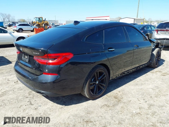 2018 BMW 6 Series 640i xDrive with VIN WBAJV6C5XJBK07708, listed as a IAAI auction lot 41784298 with 70,000 mi miles and . Bid and sale history available at carsss.com. Image 4.