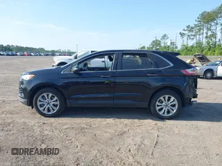 2022 Ford Edge Titanium with VIN 2FMPK4K99NBA45354, listed as a IAAI auction lot 42187761 with 75,458 mi miles and . Bid and sale history available at DreamBid. Image 14.