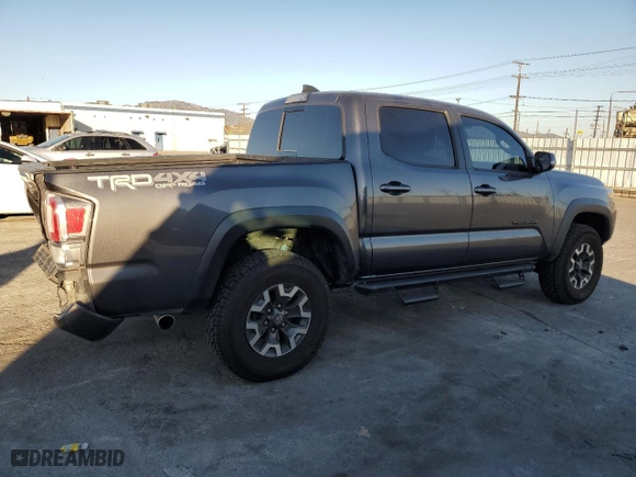 2021 Toyota Tacoma 4WD SR with VIN 3TMCZ5AN8MM453084, listed as a Copart auction lot 46718395 with 72,417 mi miles and Salvage Title. Bid and sale history available at carsss.com. Image 3.