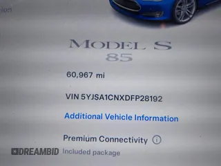 2013 Tesla Model S with VIN 5YJSA1CNXDFP28192, listed as a IAAI auction lot 42227521 with 60,967 mi miles and . Bid and sale history available at DreamBid. Image 7.