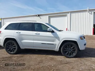 2017 Jeep Grand Cherokee Altitude with VIN 1C4RJFAG8HC768449, listed as a IAAI auction lot 41777272 with 72,913 mi miles and . Bid and sale history available at DreamBid. Image 13.
