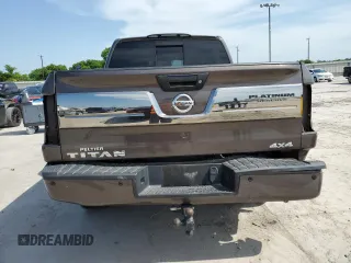 2017 Nissan Titan SV z VIN 1N6AA1E54HN512447, wystawiony jako Copart lot #56543875 z przebiegiem 119 426 mil mil oraz Czysty tytuł • Clean title. Historia ofert i sprzedaży dostępna na DreamBid. Obrazek 6.