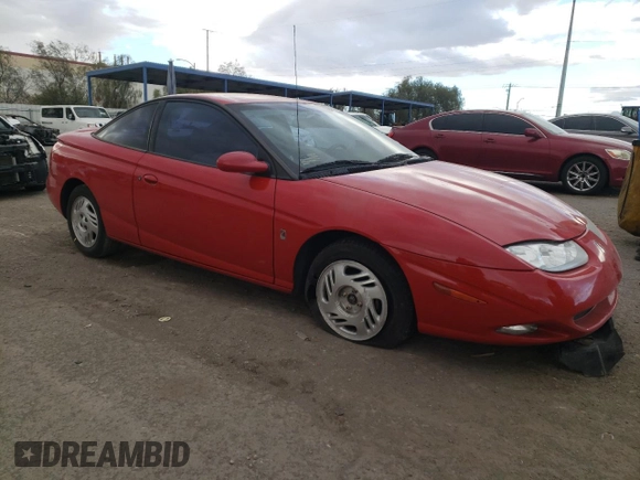 2001 Saturn SC z VIN 1G8ZY12701Z201761, wystawiony jako Copart lot #76792804 z przebiegiem 85 352 mil mil oraz Szkody całkowita. Historia ofert i sprzedaży dostępna na DreamBid. Obrazek 4.