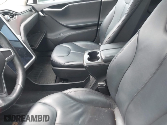 2014 Tesla Model S 60 with VIN 5YJSA1S13EFP53662, listed as a IAAI auction lot 42249930 with Not provided miles and . Bid and sale history available at DreamBid. Image 5.