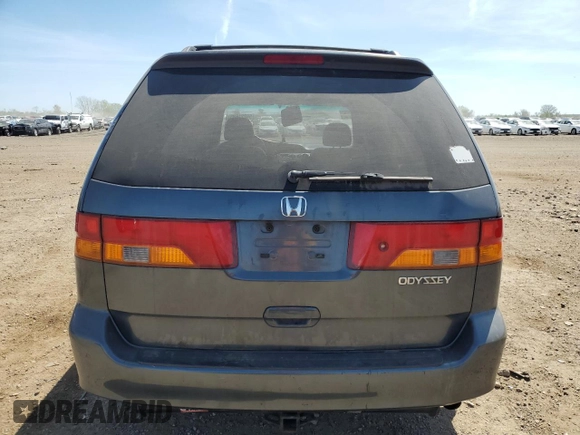 2003 Honda Odyssey EX-L z VIN 5FNRL189X3B088813, wystawiony jako Copart lot #56221685 z przebiegiem 204 443 mil mil oraz Szkoda całkowita • Salvage title. Historia ofert i sprzedaży dostępna na DreamBid. Obrazek 6.